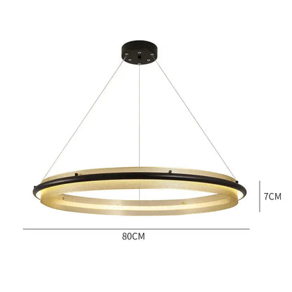 Modern gold and black honeycomb round pendant light with two mesh rings emitting warm ambient lighting for dining room decorbites honeycomb round pendant