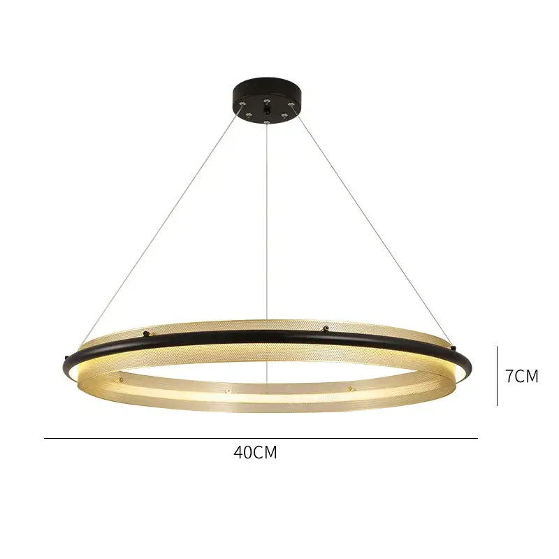 Modern gold and black honeycomb round pendant light with illuminated mesh design by decorbites for dining room decor