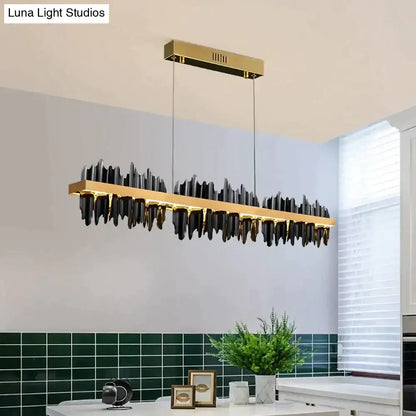 Modern black and gold rectangular pendant led chandelier lighting with sleek wave design for dining room decorbites irene