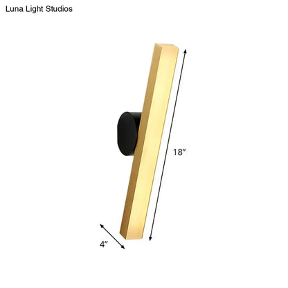 Modern gold and black led wall sconce with rectangular gold finish and black circular mounting base fixture width for living room