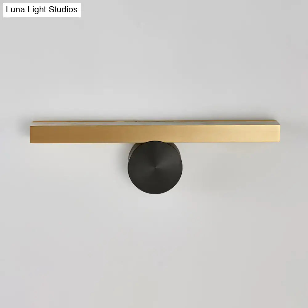 Modern gold and black led wall sconce with sleek rectangular bar and matte black base showing fixture width for living room