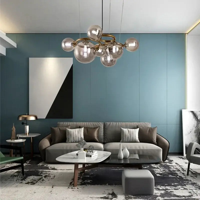 Modern gold black magic bean ceiling chandelier with spherical glass globes and brass metal frame for dining room lighting