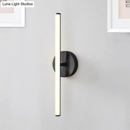 Modern gold and black minimalist wall sconce with sleek vertical led light bar for bathroom wall light use