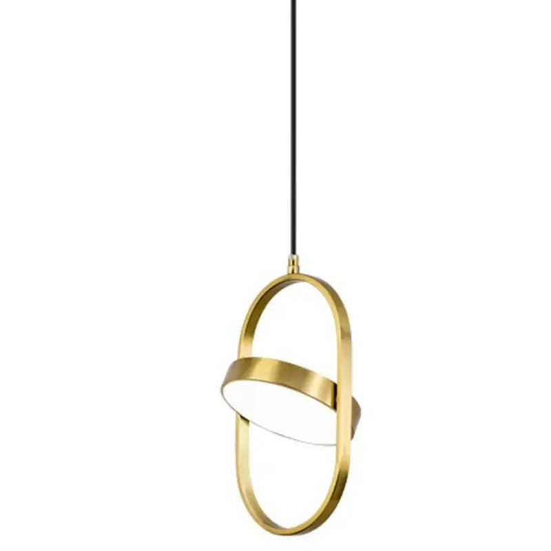 Modern gold and black oval pendant lights with sleek minimalist design and black cord suspension for kitchen decorbites gold pendant