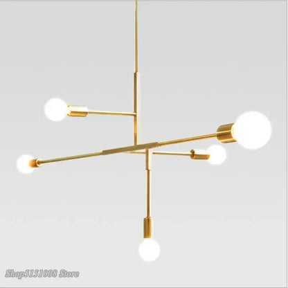 Modern gold and black finish pendant light with five white spherical bulbs in decorbites cross style for dining room decor