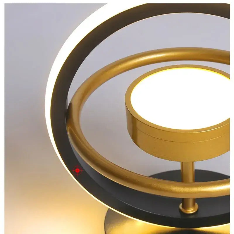 Modern gold and black ring led ceiling light with glowing circular led and black base for living room decorbites led ceiling