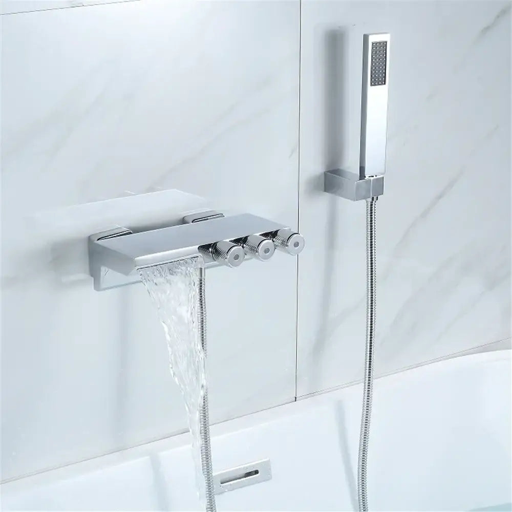 Modern chrome-finished shower set with waterfall spout, three control knobs, and handheld showerhead for gold black tub decorbites