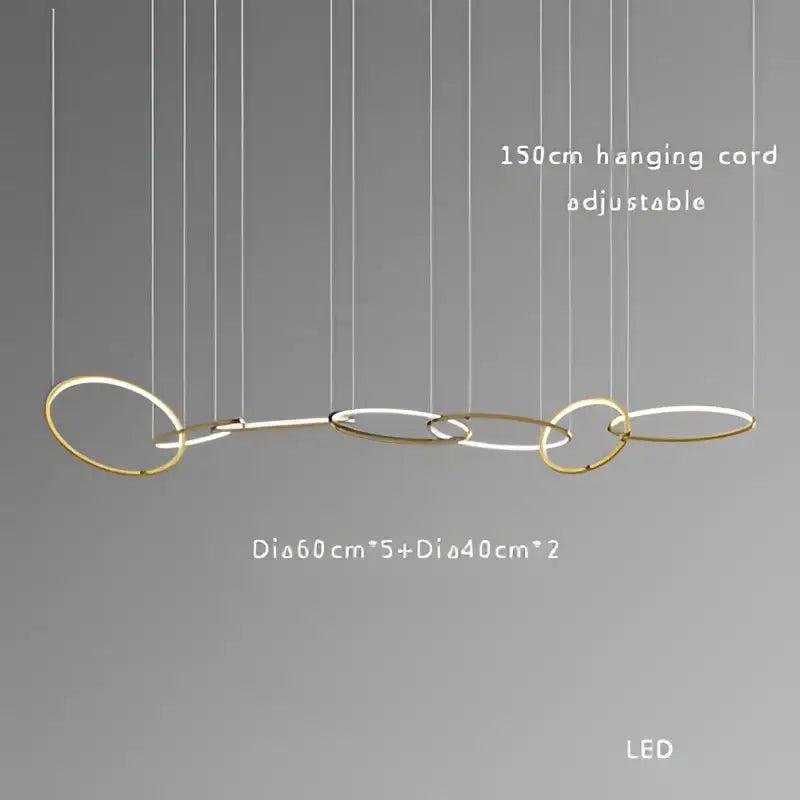 Modern gold and black stainless steel pendant lights with interconnected gold-toned rings and led illumination for dining room decorbites gold stainless