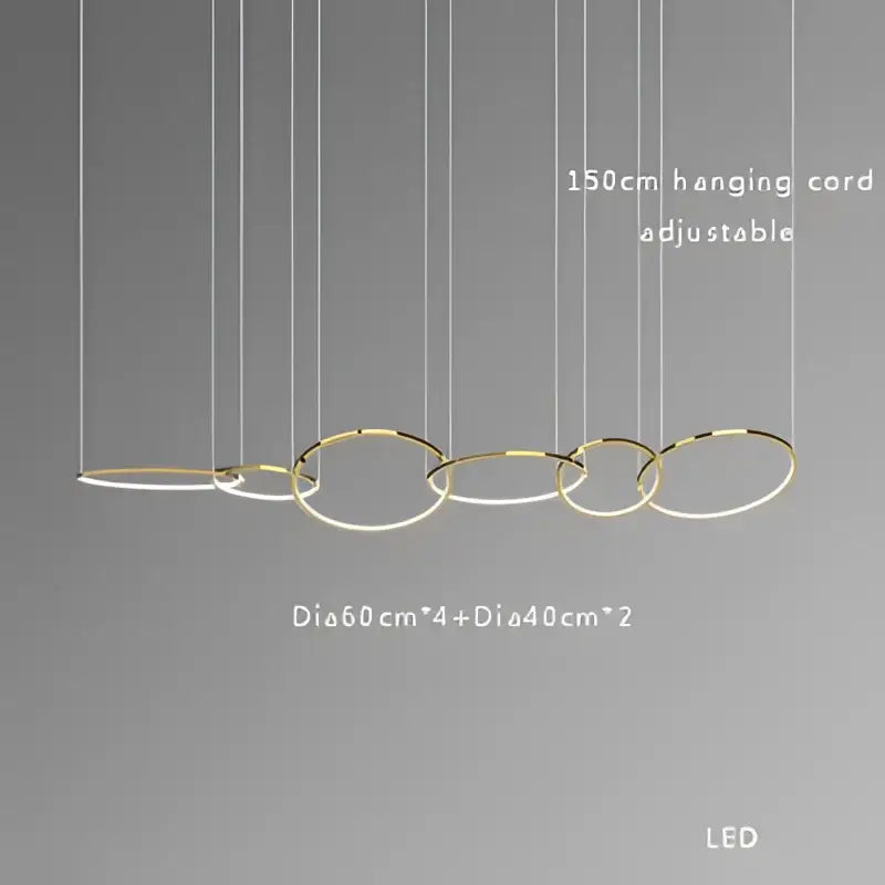 Modern gold and black stainless steel pendant lights featuring interconnected gold-toned rings for dining room decorbites gold stainless