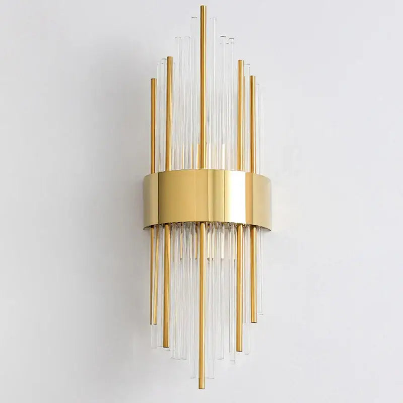 Modern gold and black stainless steel wall sconce with clear glass rods radiating from a circular base by decorbites gold stainless