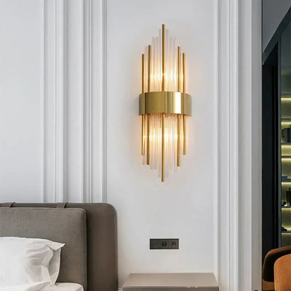 Modern gold stainless steel wall sconce with vertical glass rods and circular base for living room decorbites gold stainless
