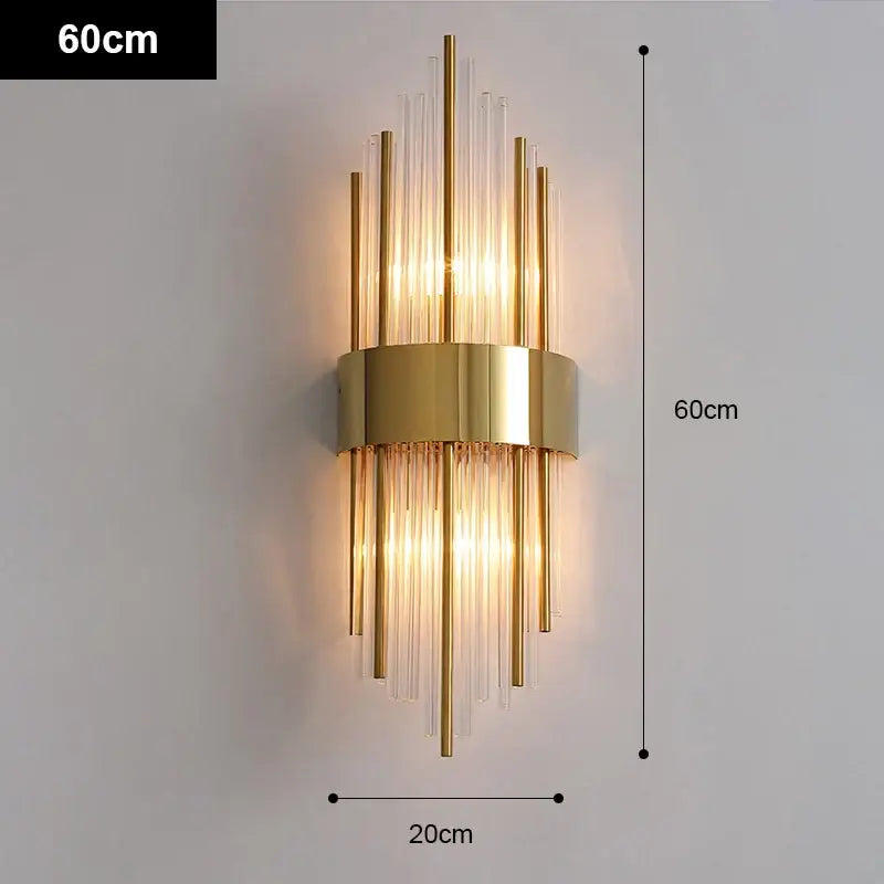 Modern gold and black stainless steel wall sconce with vertical glass rods and warm light for living room decorbites gold stainless