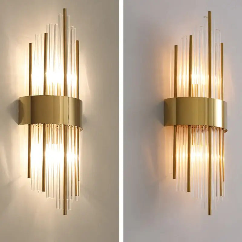 Modern gold and black stainless steel wall sconce with clear glass rods for elegant living room decorbites gold stainless design
