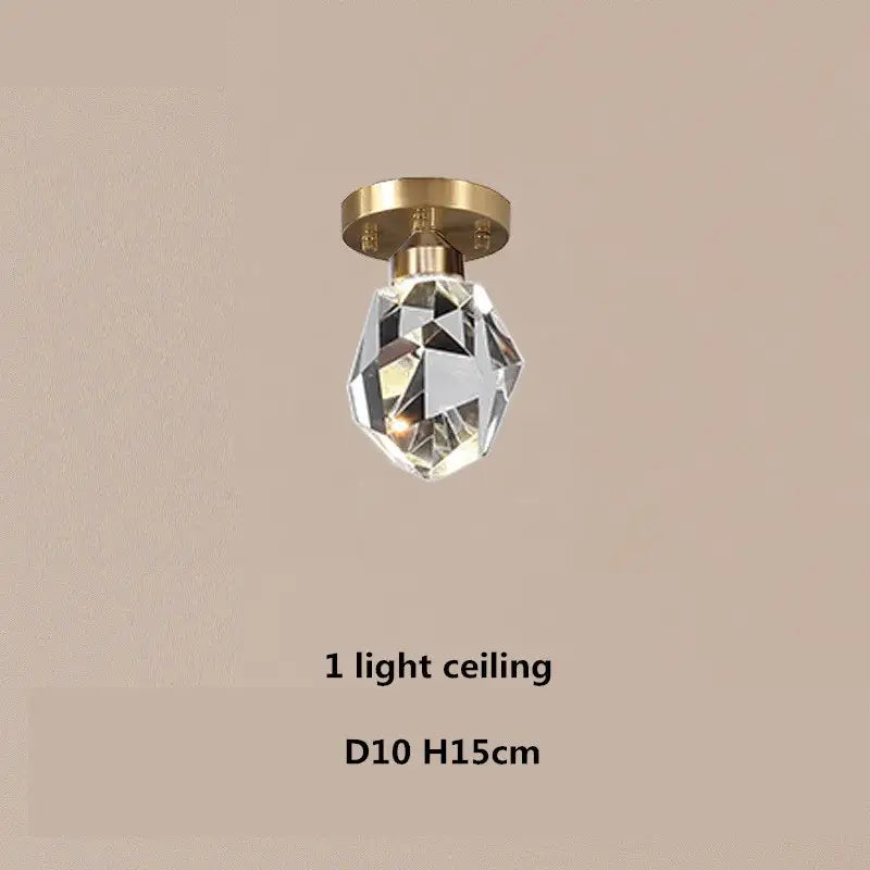 A dimmable crystal chandelier with clear faceted crystal and gold-toned ceiling mount for modern dining room decorbites copper led