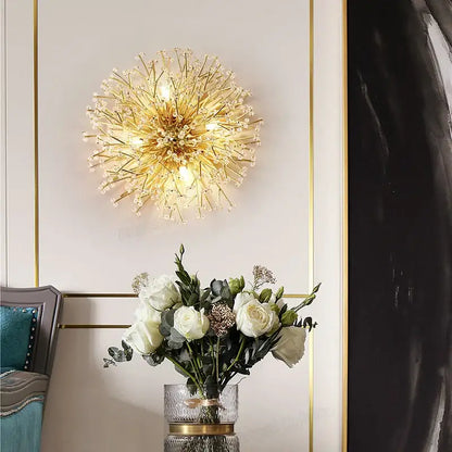 Modern gold branch crystal led wall light featuring gold-toned spherical sconce with decorbites crystal led accents