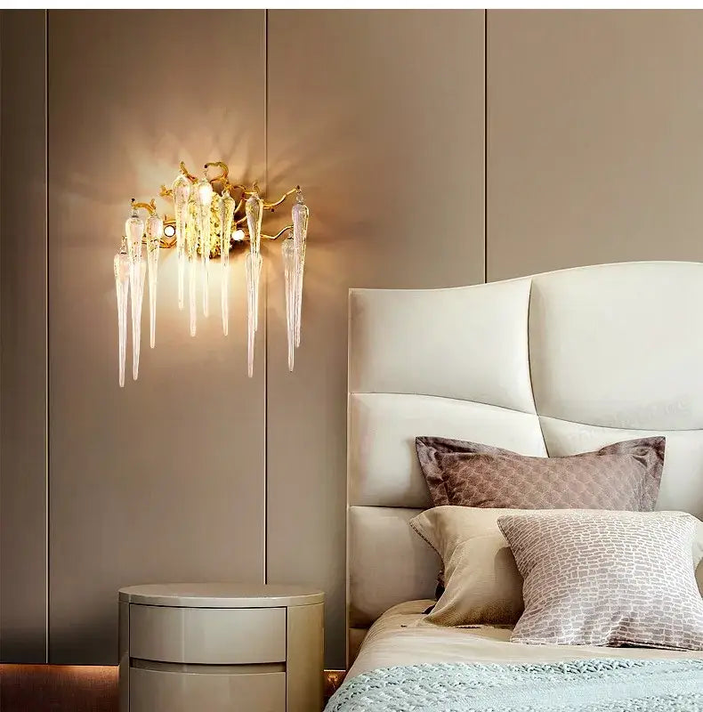 Modern gold branch crystal led wall light featuring gold-toned wall sconce with clear glass icicle decorbites crystal led elements