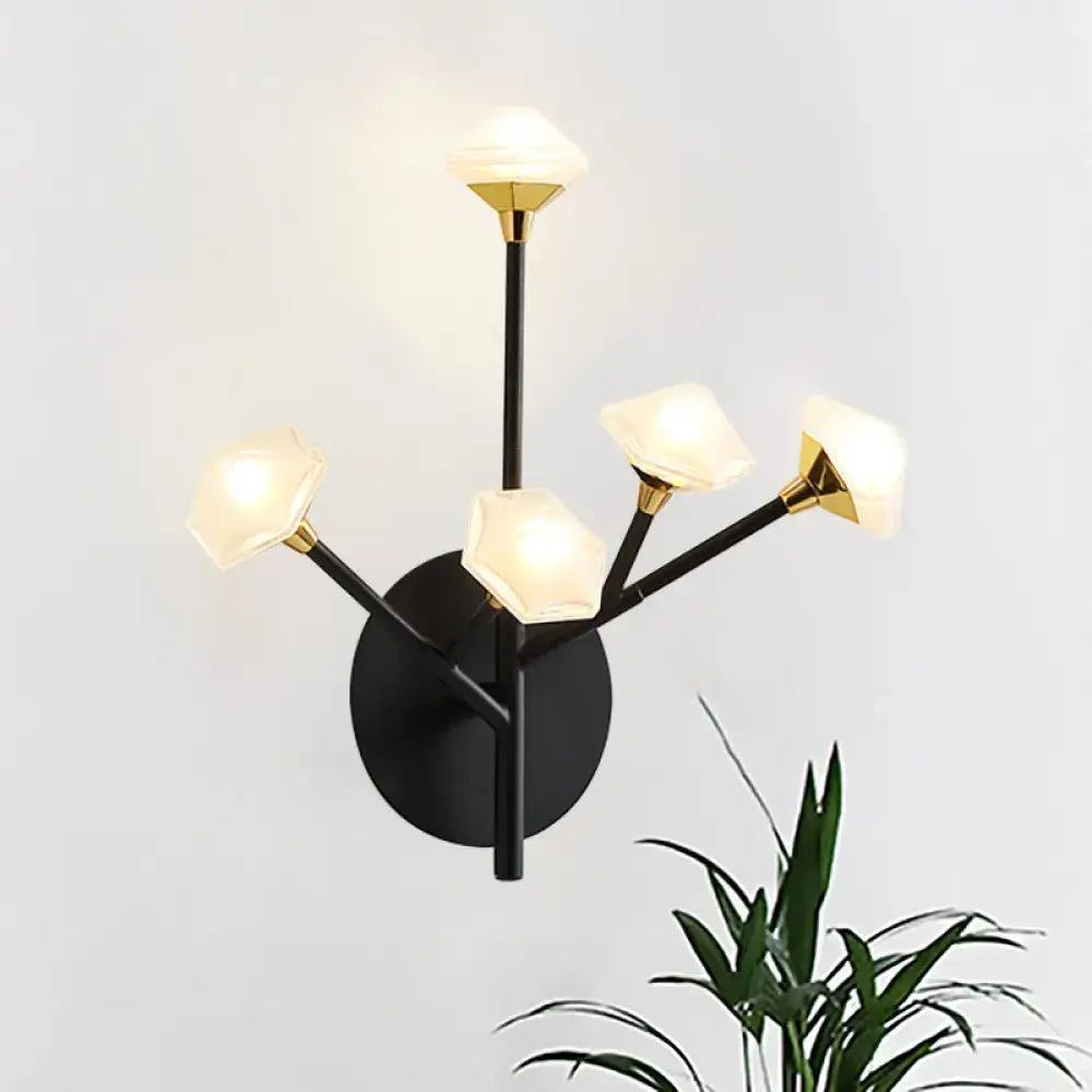 Modern gold branching wall sconce with black wall light and faceted acrylic shade for living room decor