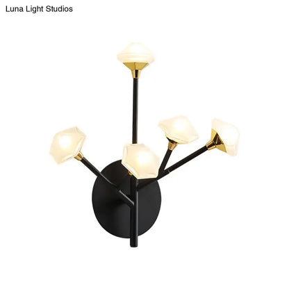 Modern gold branching wall sconce with black and gold wall light featuring five geometric acrylic shades for living room