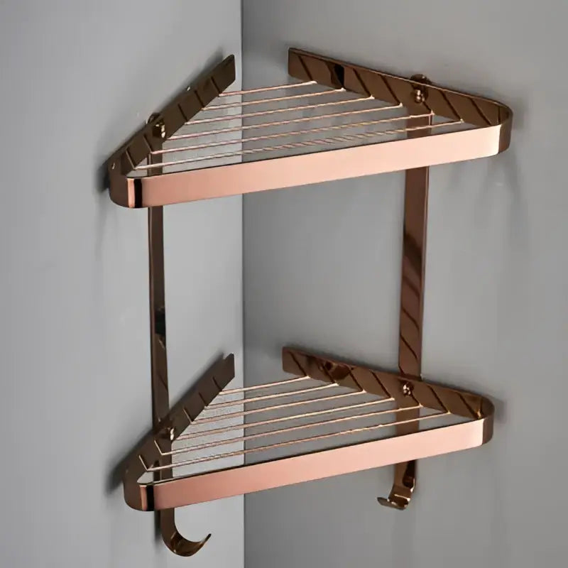 Modern gold brass bathroom shower rack with hooks featuring a rose gold two tier corner shelf and brushed metal finish