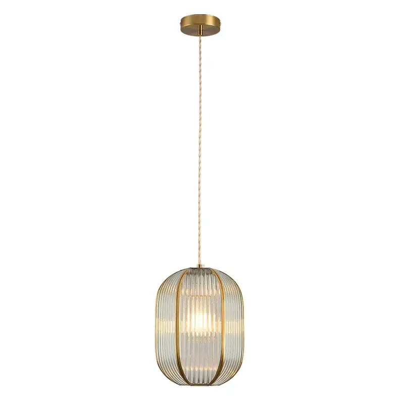 Modern gold brass glass restaurant light with vertical glass panels and a matching chain from decorbites brass glass collection