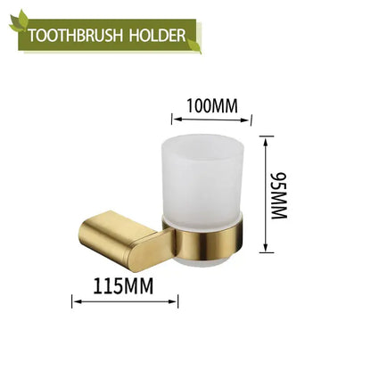 Gold-toned metal toothbrush holder with frosted white glass cup in modern decorbites bathroom accessories set