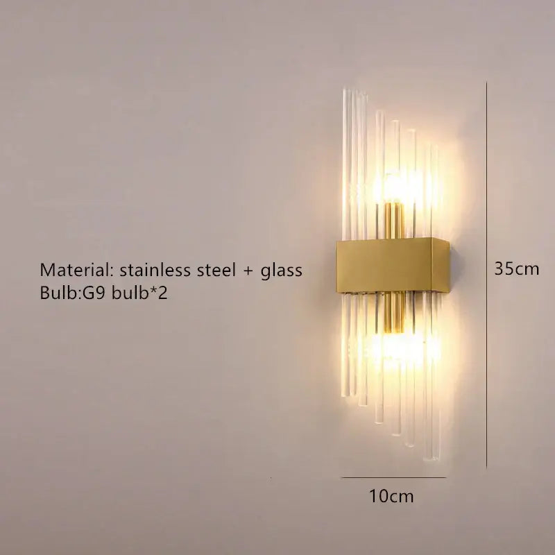 Modern gold led wall lamp with brushed steel base and vertical glass rods for living room decorbites gold led lighting