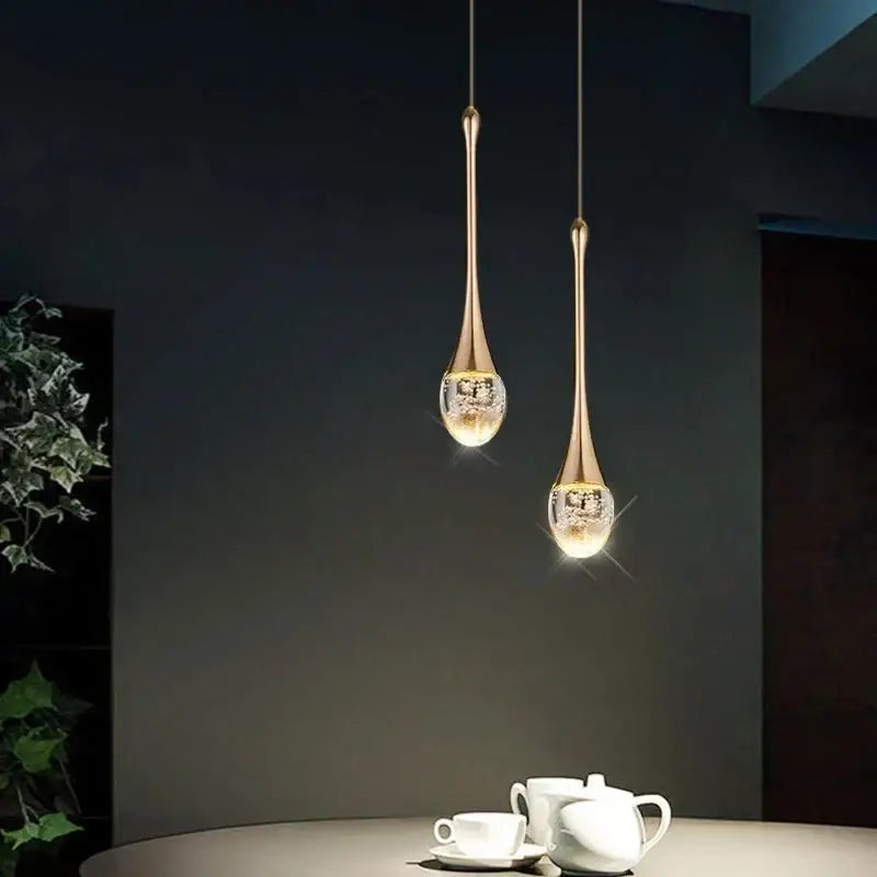 Modern gold bubble crystal chandelier dining room pendant light with two gold-toned teardrop glass globes and mosaic interior