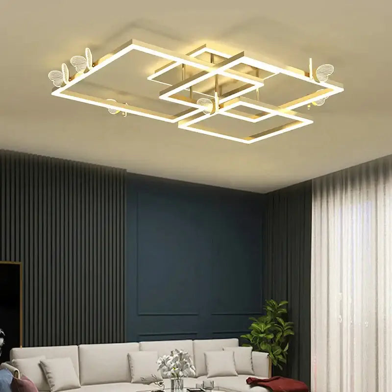 Modern gold butterfly ceiling lamp with geometric design and integrated decorbites butterfly ceiling accents for living room