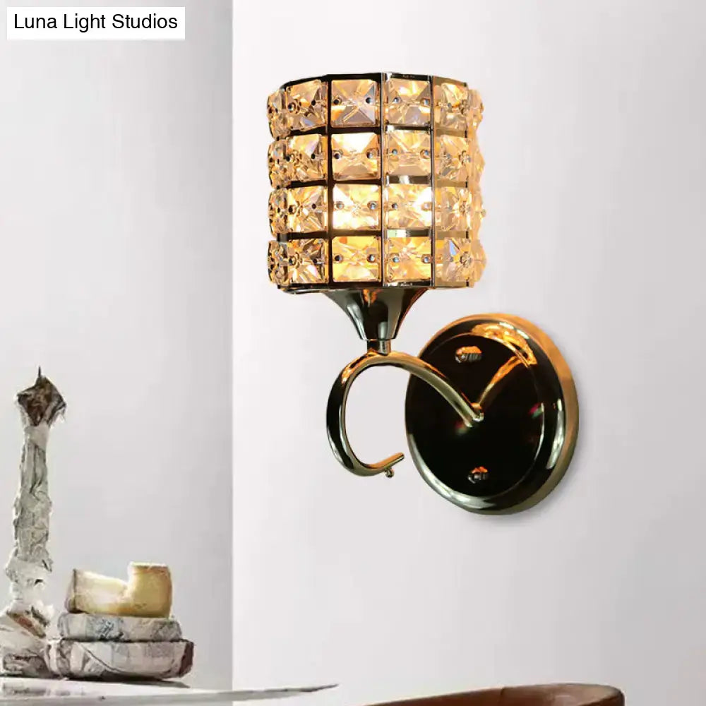 Modern gold butterfly wall light fixture with crystal shade and gold-toned cylindrical grid pattern sconce for living room