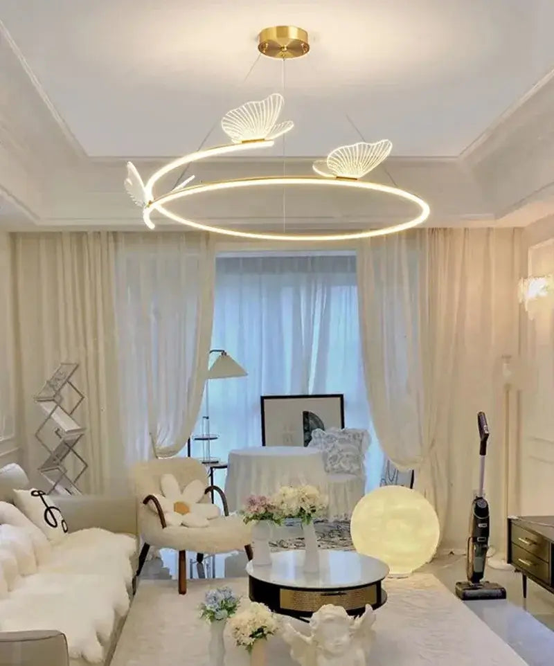 Modern gold butterfly design sense ceiling chandelier with circular frame and butterfly-shaped light fixtures for dining room decorbites butterfly design