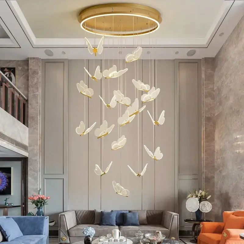 Modern gold butterfly led chandelier with multiple translucent white butterfly lights on a circular frame decorbites butterfly led