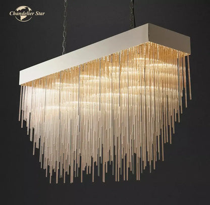 Modern gold cascada rectangular led chandelier with sleek white metal frame and cascading golden glass rods for dining room decorbites cascada rectangular