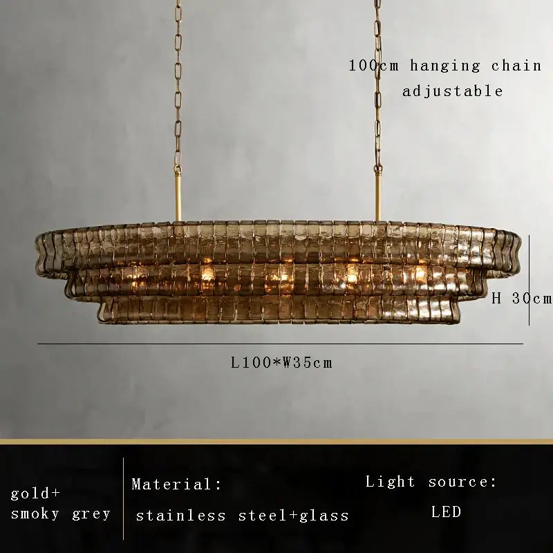 Modern gold cascading crystal pendant lights with smoky grey brown glass pendant and stainless steel tiered design