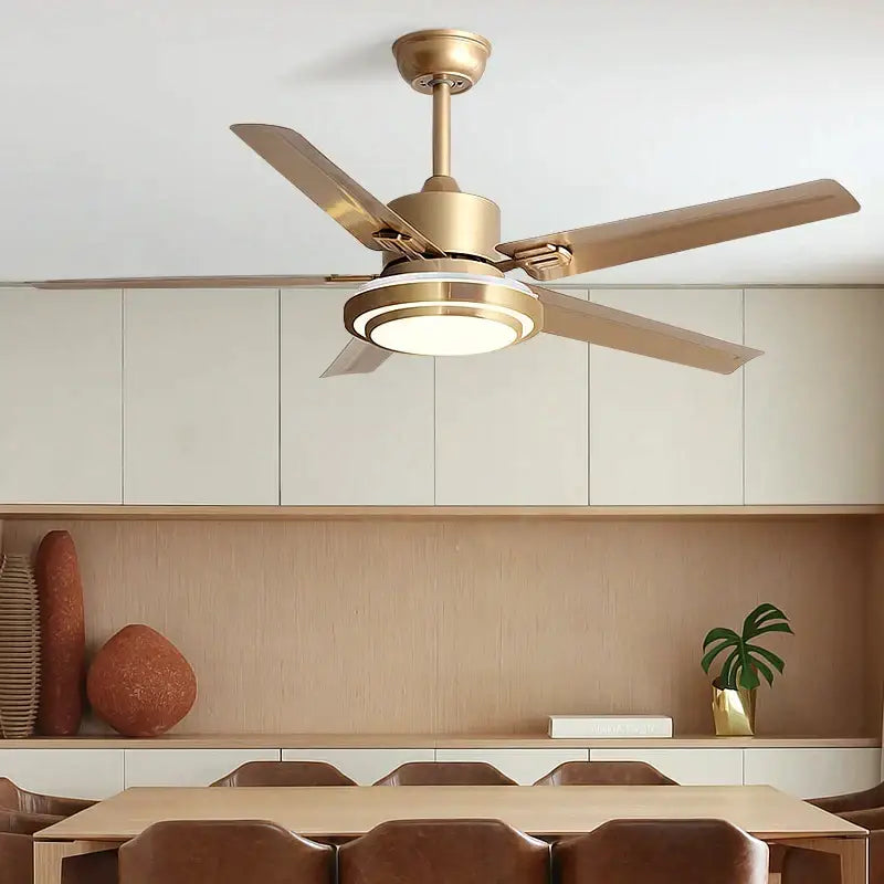 Gold-finished modern ceiling fan with five stainless steel blades and integrated led light for bedroom use