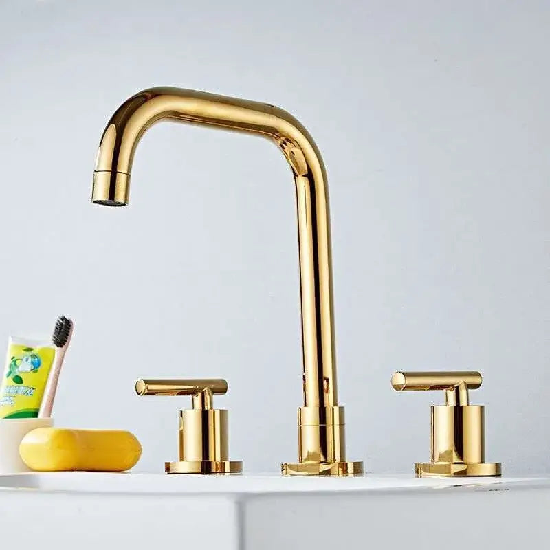 Modern gold and chrome brass basin faucet with sleek curved spout and two matching handles for kitchen sink decorbites brass basin faucet