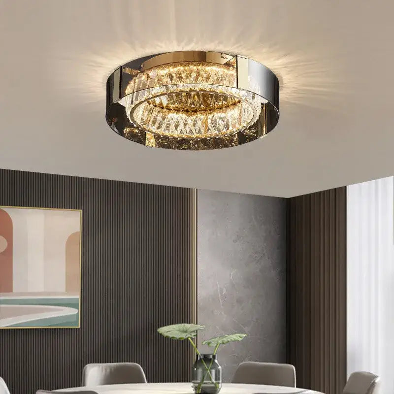 Modern gold and chrome crystal led ceiling lamp featuring two concentric faceted crystal rings by decorbites ceiling lamp