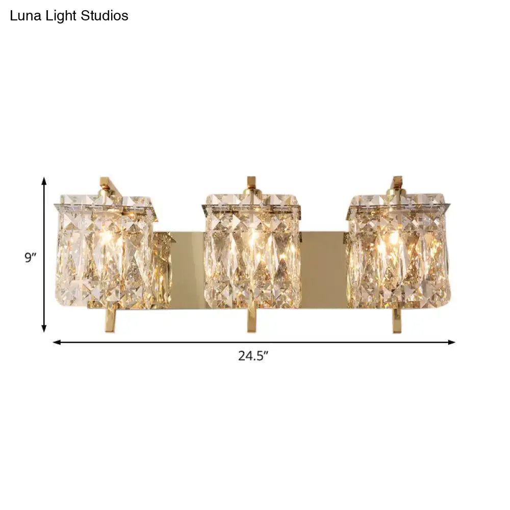 Gold-toned wall light fixture with three rectangular crystal shades faceted cuttings for e12 e14 bulb base use