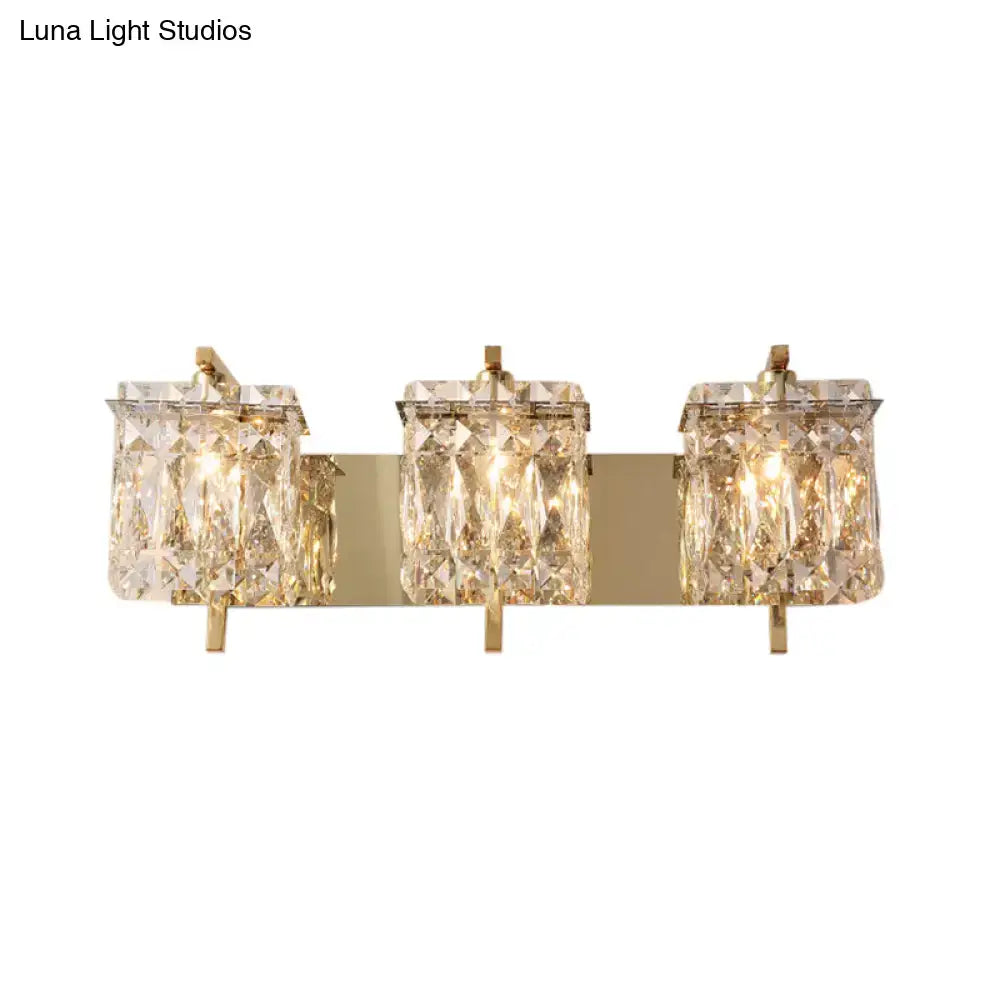 Modern gold and chrome wall light fixture with three rectangular crystal shades featuring e12 e14 bulbs and warm illumination