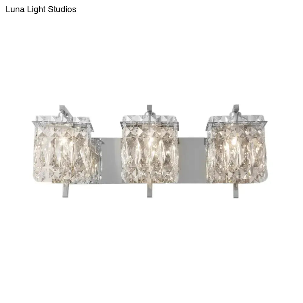 Modern gold and chrome crystal wall light with three faceted rectangular shades and e12 e14 fixture width