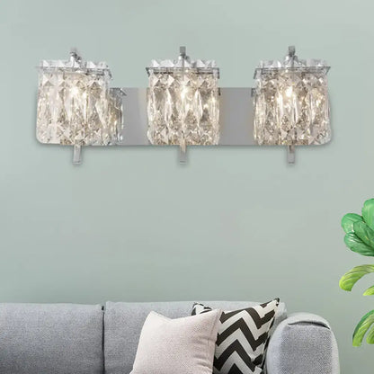Three-light crystal wall light with faceted clear glass shades and sleek chrome finish for e12 e14 fixtures