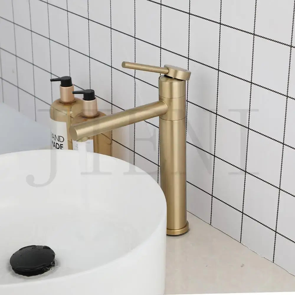 Modern gold and chrome single handle basin faucet with sleek minimalist design and decorbites gold plated finish