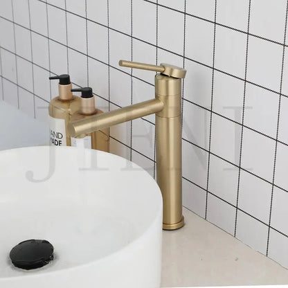 Modern gold and chrome single handle basin faucet with sleek minimalist design and decorbites gold plated finish