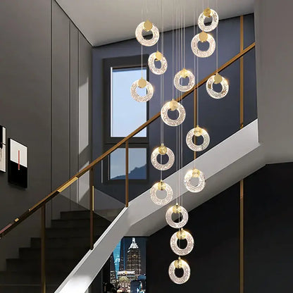 A modern gold circular crystal led chandelier with multiple crystal-encrusted light fixtures for living room decorbites circular crystal lighting