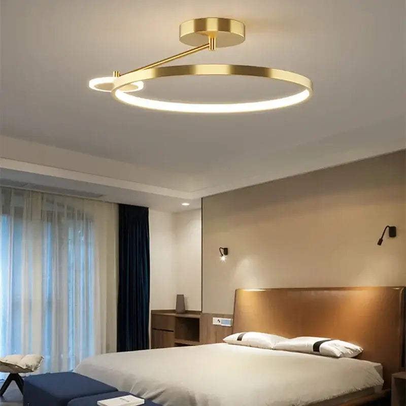 Modern gold circular led ceiling lamp with two concentric rings and integrated glow for minimalist bedroom decorbites circular led