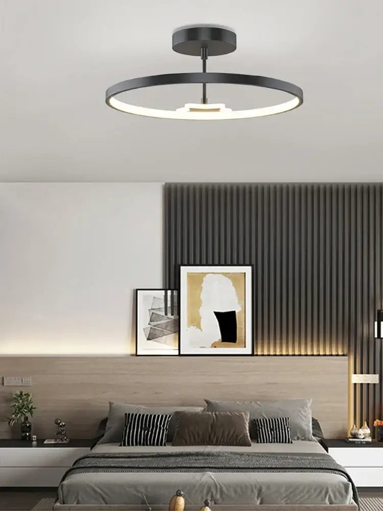 Modern black circular led ceiling lamp with sleek minimalist design and integrated lighting for decorbites circular led use
