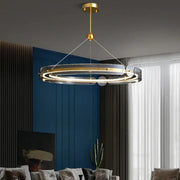 Modern gold circular ring led chandelier with sleek metal frame and transparent acrylic rings for dining room decorbites circular ring
