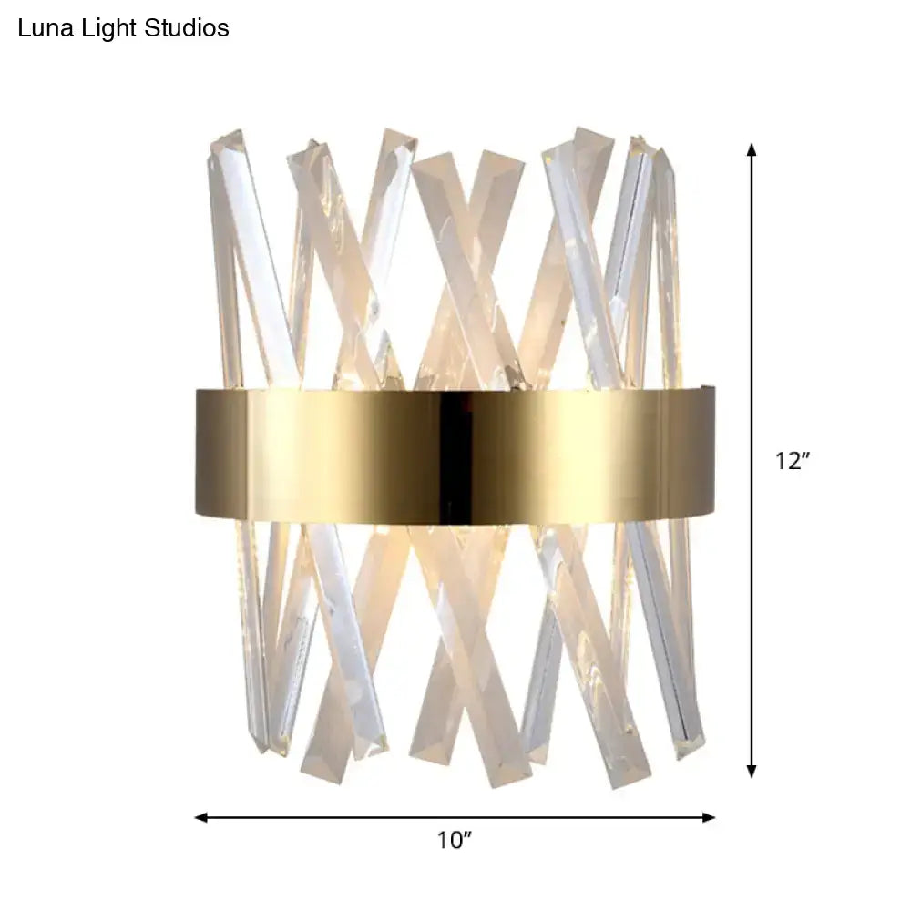 Modern gold clear crystal sconce with a metallic band and fixture height of 12in for bedroom wall lighting