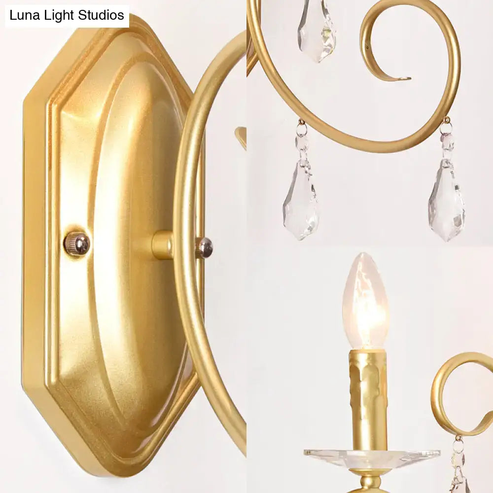Gold-finished wall lamp with elegant curved arms and clear crystal teardrop pendants for 110v to 240v use