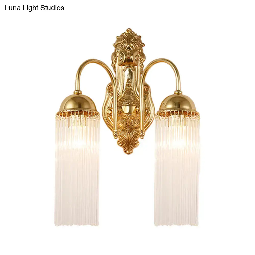 Modern gold clear crystal wall sconce with metal gooseneck arm and two fluted glass shades for corridor lighting