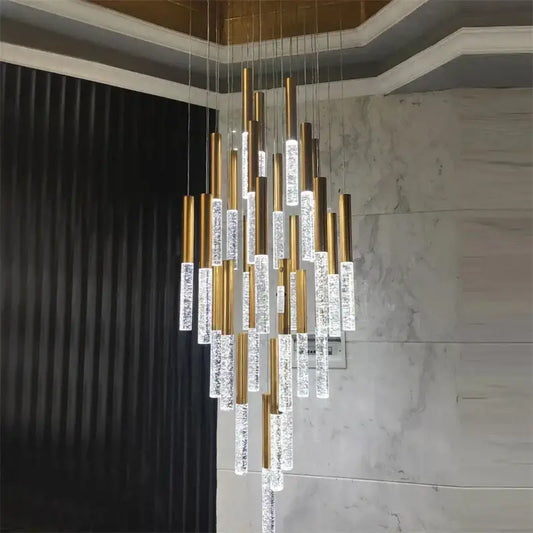 Modern gold and clear decorbites crystal led chandelier with cascading cylindrical lights for living room use